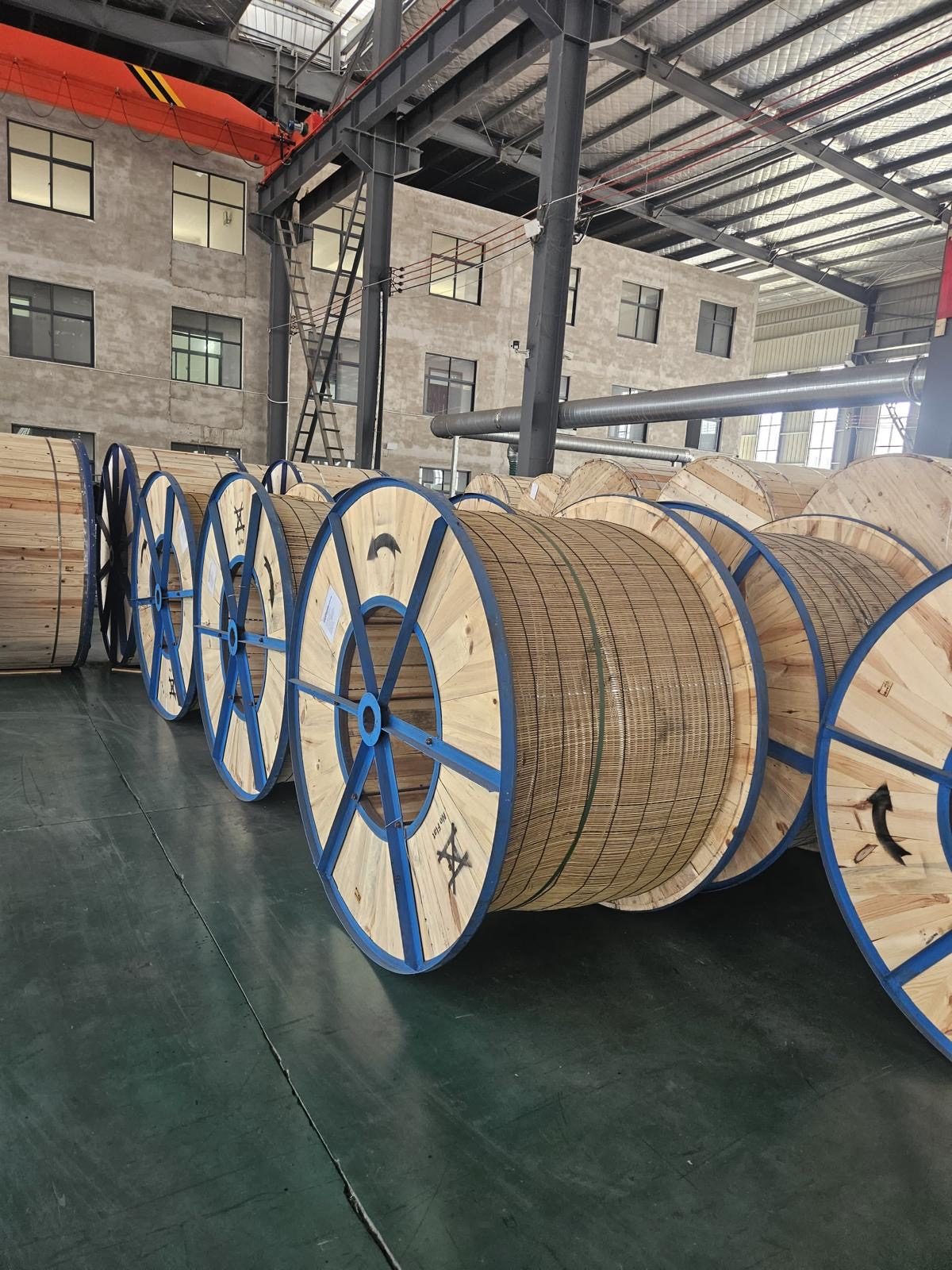 Cable drums stored in a warehouse awaiting despatch