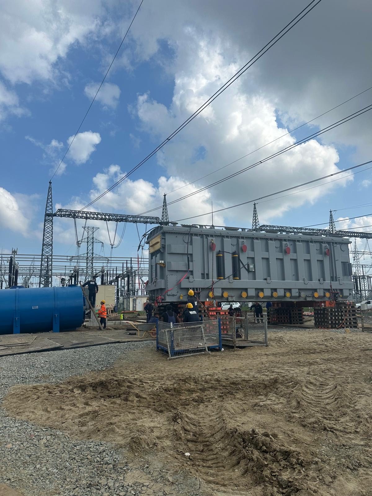 A power transformer positioned on site at a substation under construction